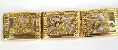 Lot 515 - An Egyptian yellow metal eight section...