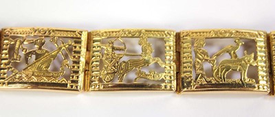 Lot 515 - An Egyptian yellow metal eight section...