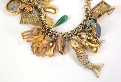 Lot 516 - A 9ct yellow gold curblink bracelet with 9ct...