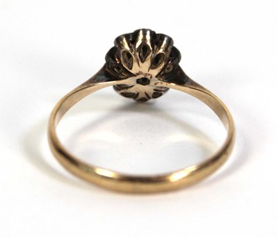 Lot 520 - A 9ct yellow gold cluster ring set paste...
