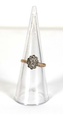 Lot 520 - A 9ct yellow gold cluster ring set paste...