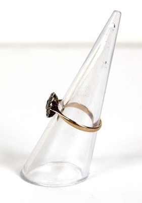 Lot 520 - A 9ct yellow gold cluster ring set paste...
