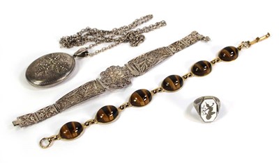 Lot 522 - An Asian metalware swivel ring niello...