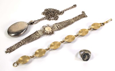 Lot 522 - An Asian metalware swivel ring niello...